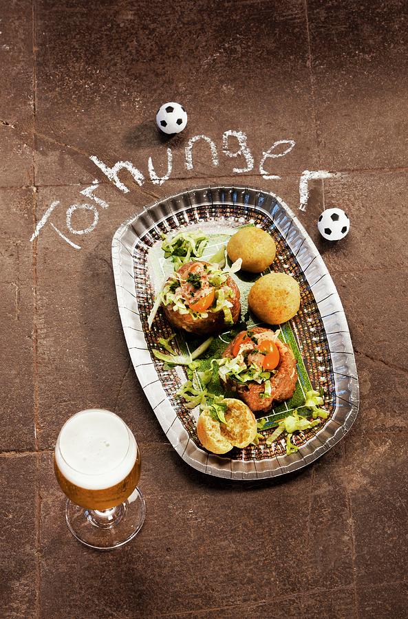 Minced Meat Cupcakes, Cheese Rolls And Beer For A Football-themed Party Photograph by Birgit Twellmann