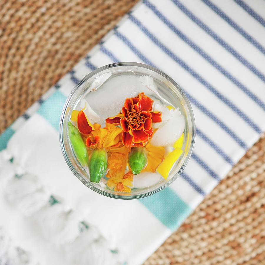 Mineral Water In A Glass Infused With Melon And Edible Flowers top View Photograph by Blooming Bites Photography