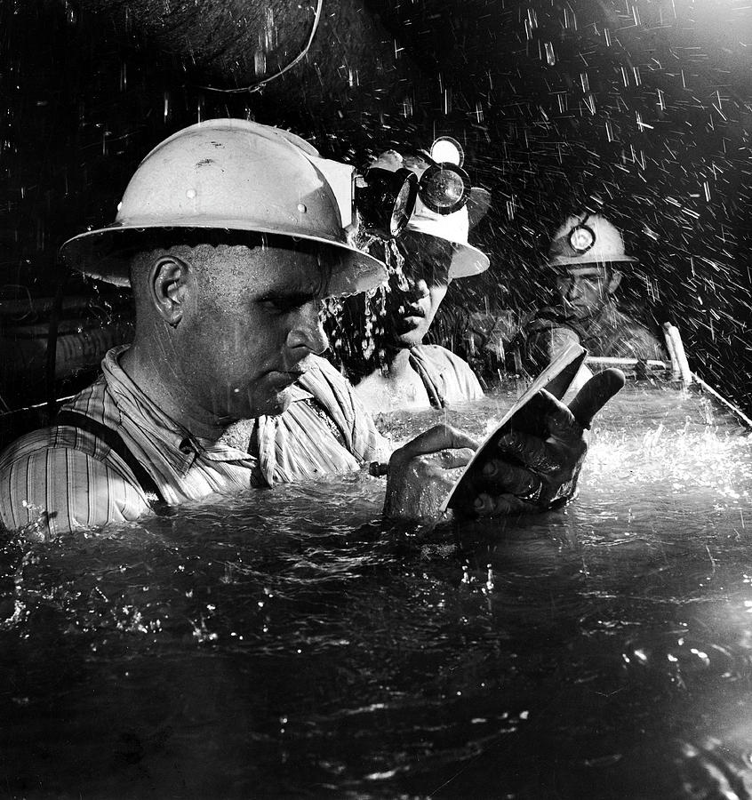 Miners Cool Down In Water Photograph by George Silk