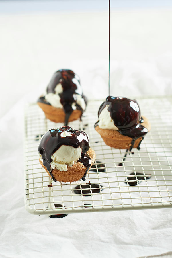 Mini Almond Muffins With Vanilla Ice Cream And Chocolate Sauce Photograph by Yehia Asem El Alaily