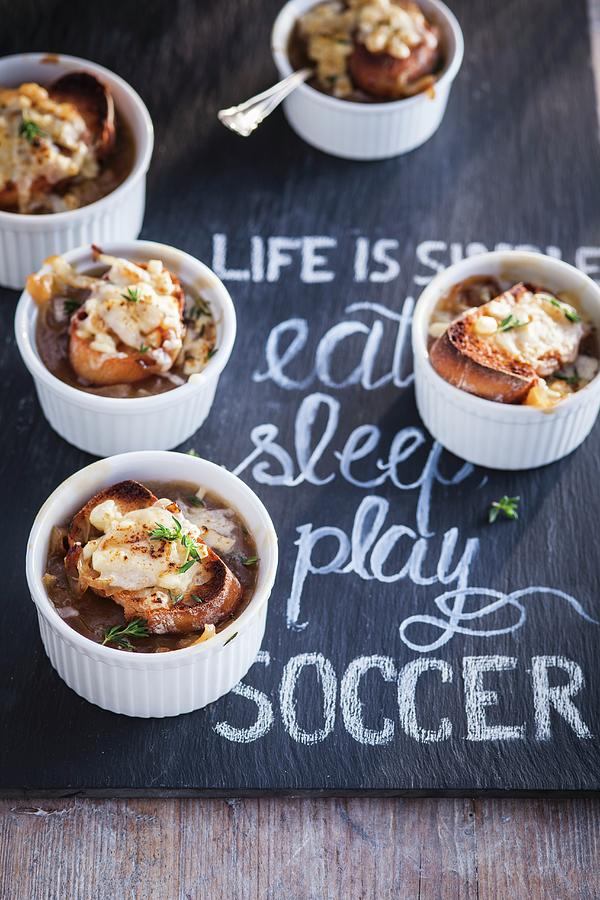 Mini Bowls Of French Onion Soup On A Slate Photograph by Eising Studio