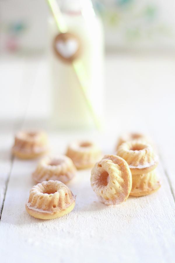 Mini Bundt Cakes On A White Wooden Table Photograph by Sylvia E.k Photography