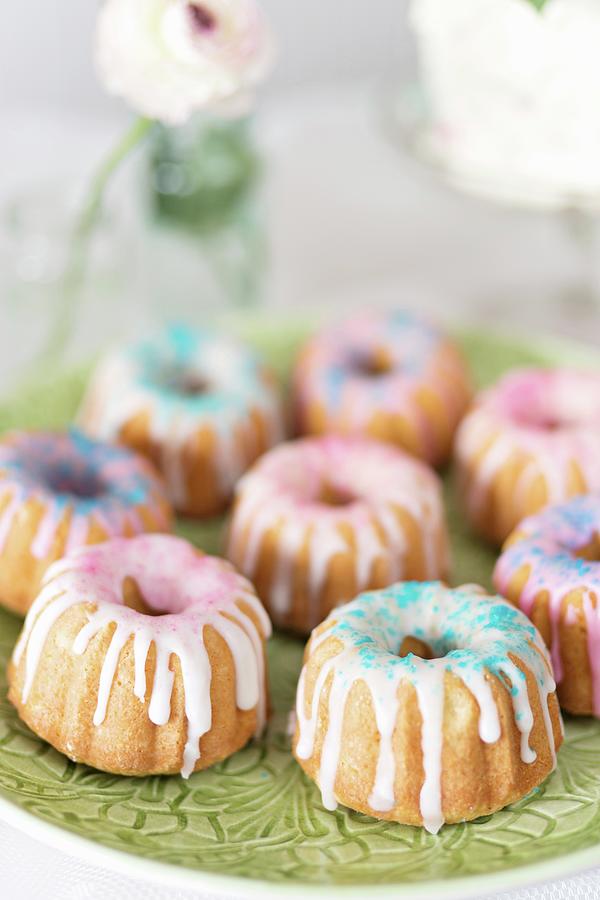 Mini Bundt Cakes With Icing Photograph by Cecilia Mller