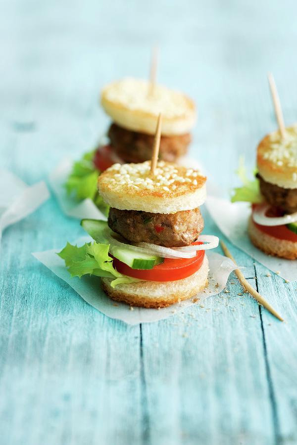 Mini Burgers With Sesame Seeds Photograph by Michael Wissing