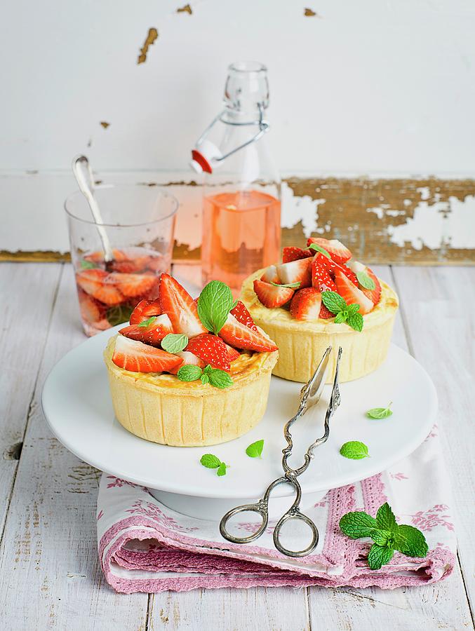 Mini Cheesecakes With Strawberries Photograph by Schall, Ewgenija