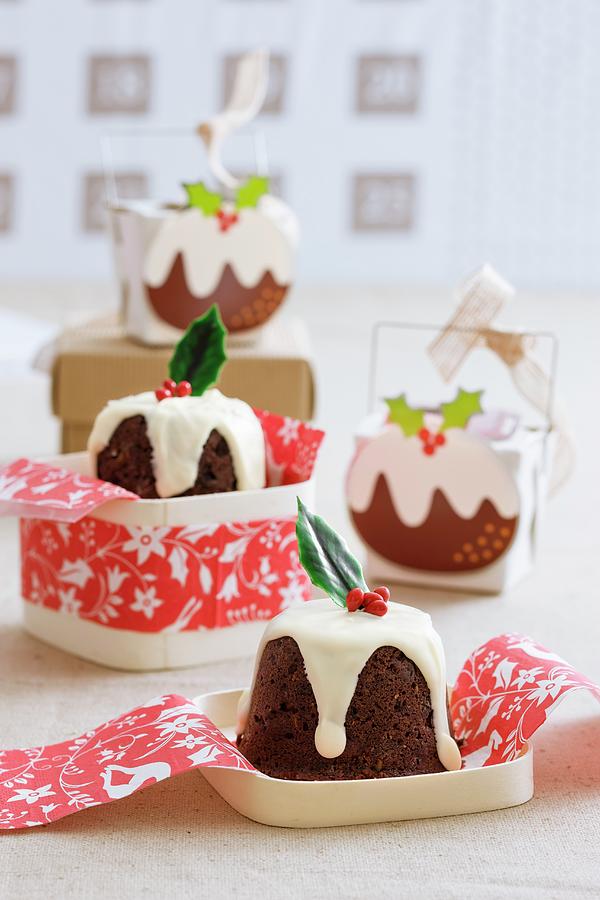 Mini Christmas Puddings With White Icing Photograph by Andrew Young