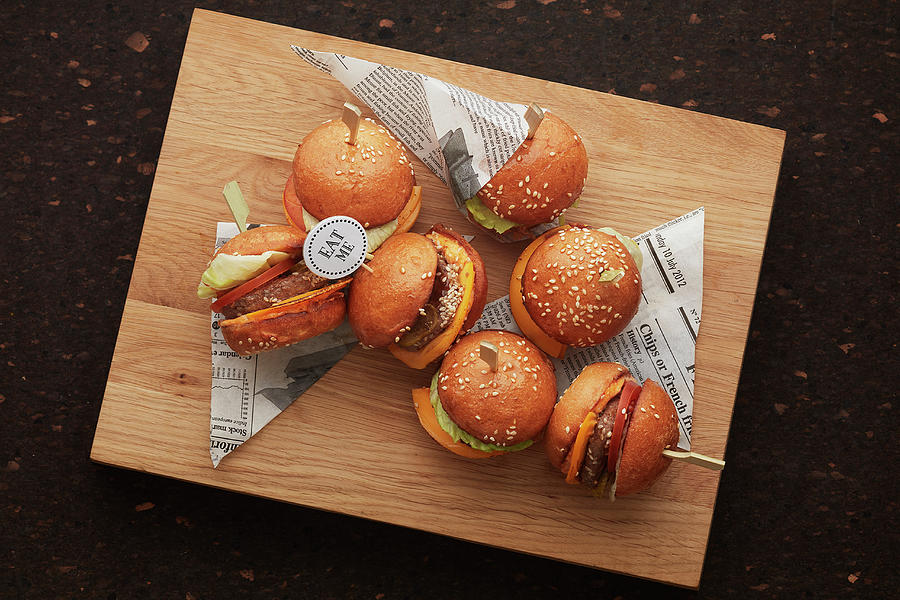 Mini Hamburgers On Skewers On Wooden Board Photograph by Atelier Mai 98