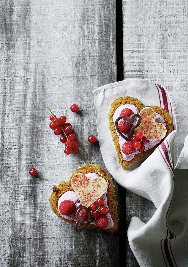 Mini Heart-shaped Cakes Topped With Berries For Valentines Day Photograph by Mikkel Adsbl