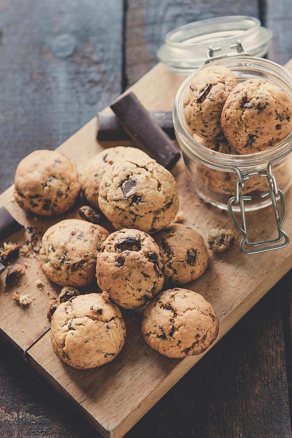 Mini Homemade Chocolate Chip Cookies On Wooden Background, Selective Focus Photograph by Ltummy