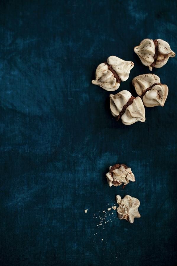 Mini Meringues Filled With Coffee Cream, One Partly Eaten seen From Above Photograph by Magdalena Hendey