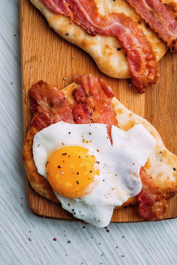 Mini Naan Bread Breakfast With Bacon And Eggs Photograph by Adrian Britton
