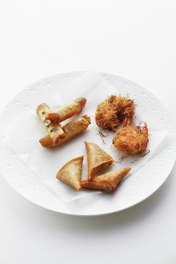 Mini Pastry Rolls Filled With Scamorza Cheese And Truffles, Prawns With Yuzu And Miso, And Duck With Prunes In Brick Pastry Photograph by Atelier Mai 98