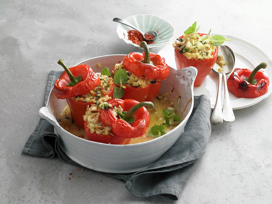 Mini Peppers Stuffed With Couscous And Pine Nuts Photograph by Nikolai Buroh