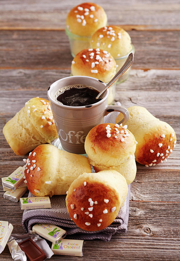 Mini Sweet Bread Rolls Made In Jars With Sugar Nibs And A Cup Of Coffee For Easter Photograph by Teubner Foodfoto