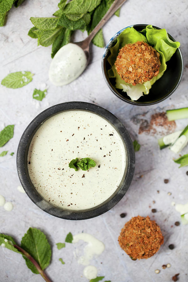 Mint Tahini Sauce In A Bowl Photograph by Jane Saunders