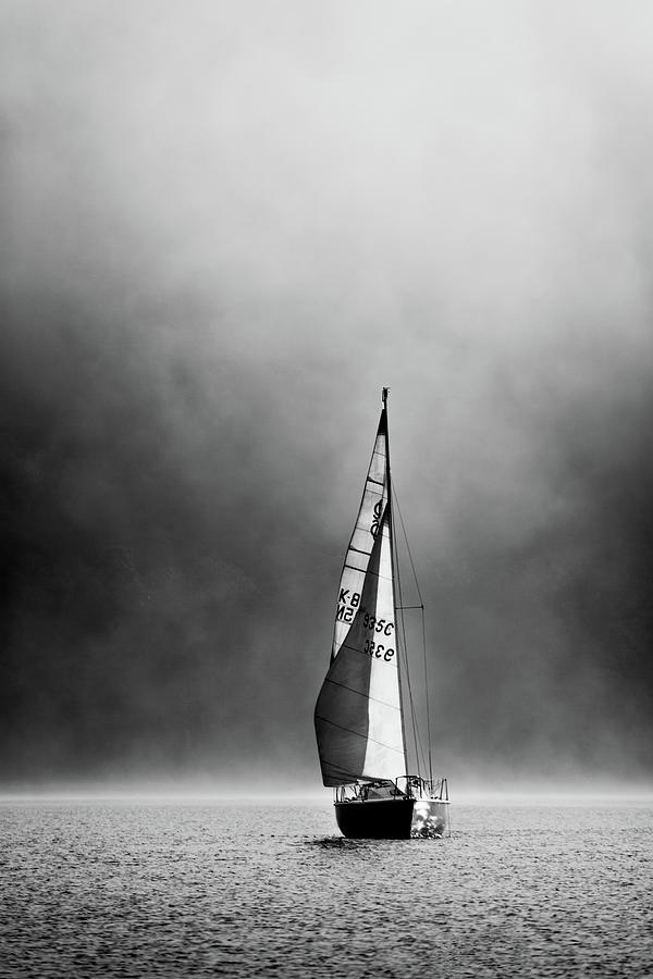 Mist rising and sail boat, Coniston Water - Portrait Photograph by Anita Nicholson