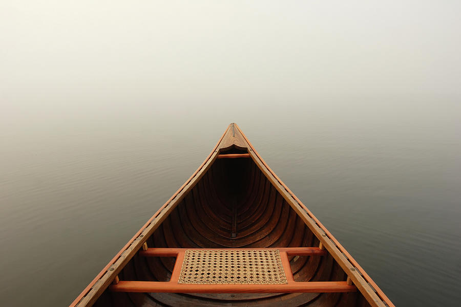 Misty Canoe Photograph by Huntimages