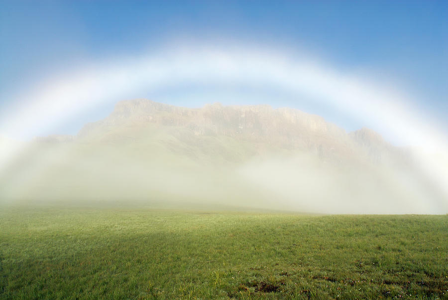 Misty Rainbow Over Redi Peak In The Photograph by Emil Von Maltitz