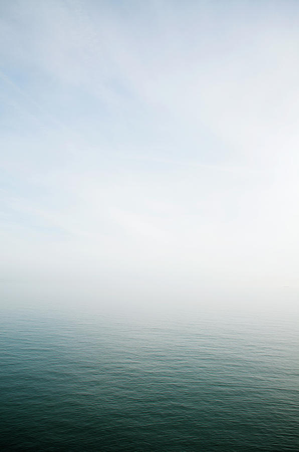 Misty Sea Horizon Background Photograph by Peskymonkey
