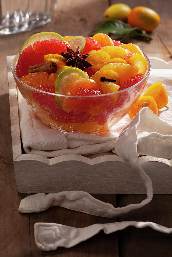 Mixed Citrus Fruit Salad With Honey And Star Anise Photograph by Blueberrystudio