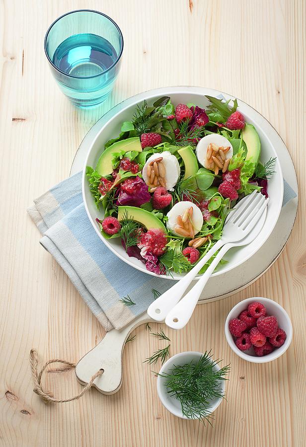 Mixed Leaf Salad With Avocado, Raspberries, Goats Cheese, Dill And Pine Nuts Photograph by Ewgenija Schall