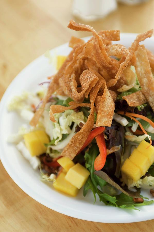 Mixed Salad With Mango And Fried Dough Strips Photograph by Rank, Erik