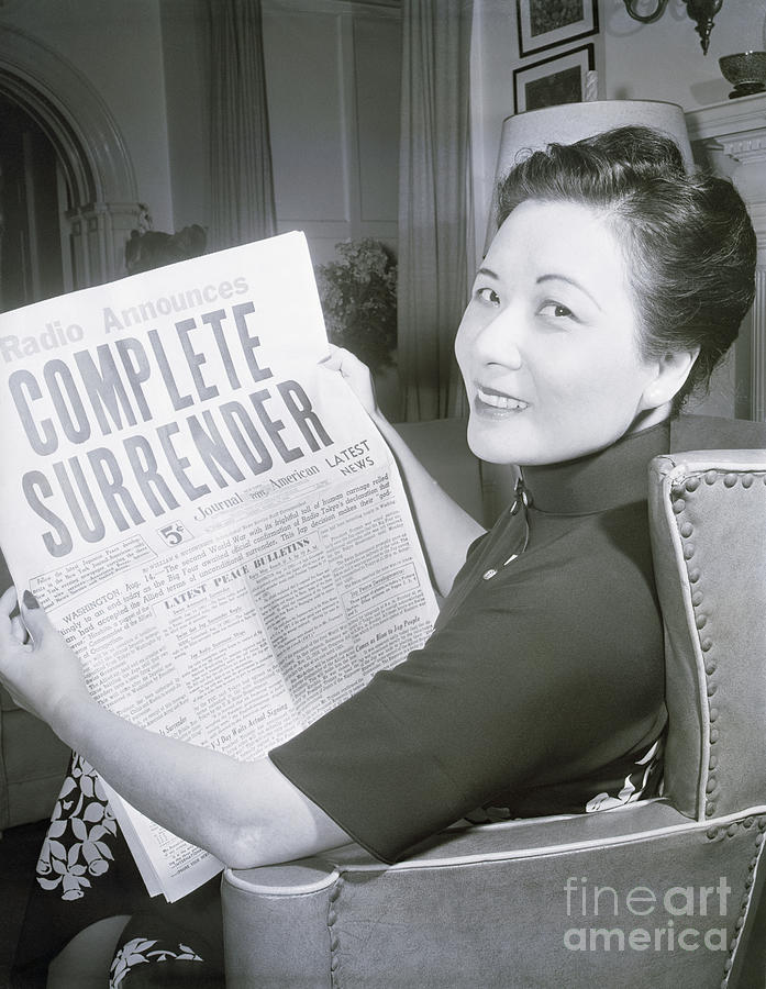 Mme. Chiang Kai-shek Looking At Headline Photograph by Bettmann Mme. Chiang Kai-shek Looking At Headline Photograph by Bettmann
