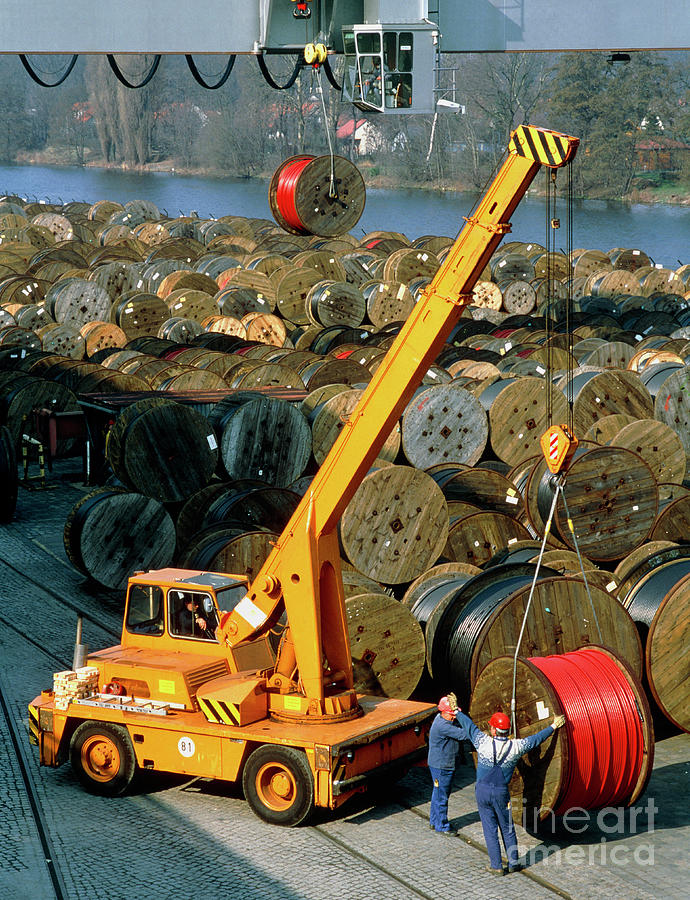 Mobile Crane Lifts Reels Of Electrical Cabling Photograph by Maximilian Stock Ltd/science Photo Library