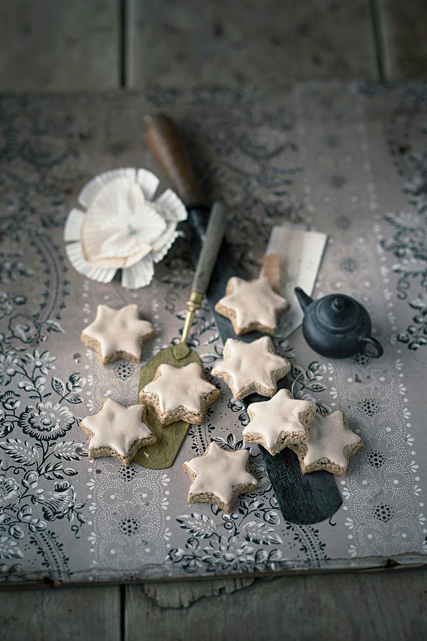 Mocha And Walnut Stars With Icing Sugar Photograph by Jalag / Wolfgang Schardt