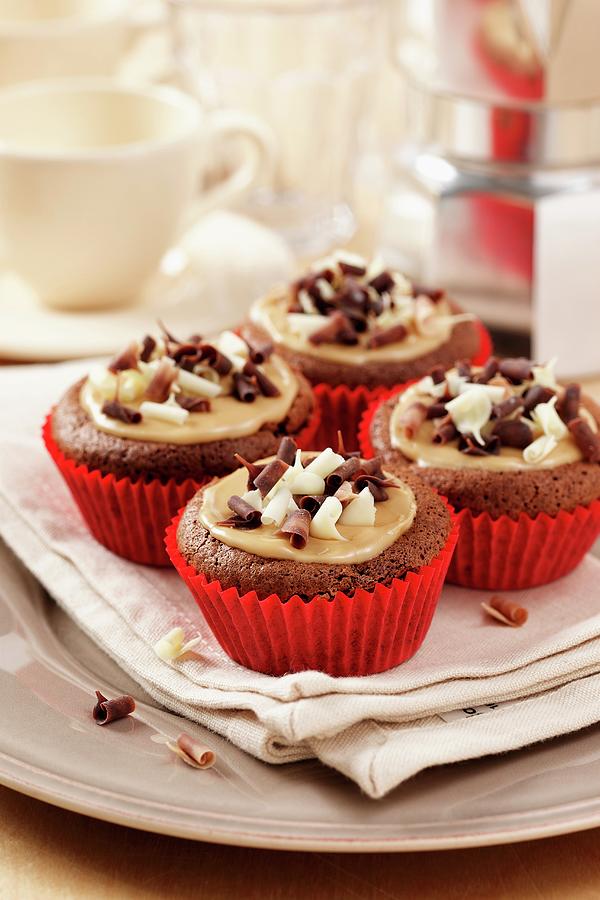 Mocha Chestnut Cupcakes On A Cream Napkin And Plate With Coffee Cups And Percolator In Background Photograph by Stuart Macgregor