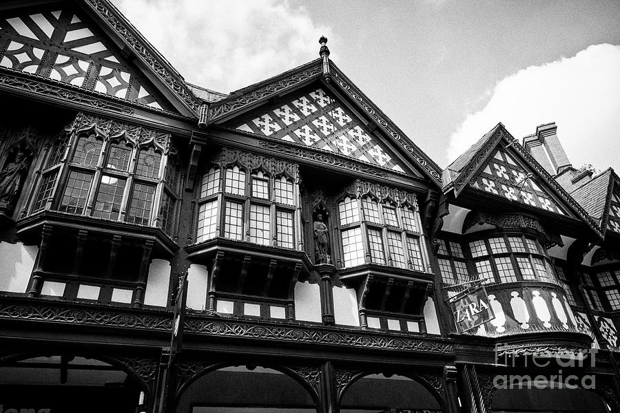 Architecture Photograph - Mock Tudor Architecture On Shoemakers Row On Northgate Street Including Statue Of St Crispin Chester by Joe Fox