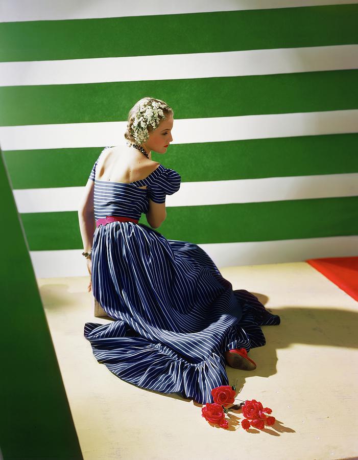 Model In A Striped Blue Dress Photograph by Horst P. Horst