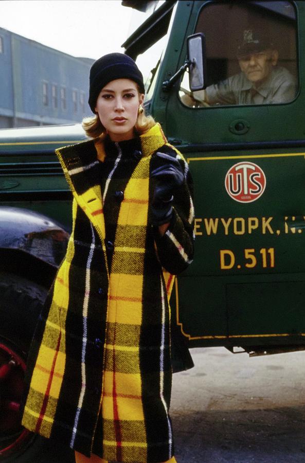 Model In Plaid Beside Armored Car Photograph by George Barkentin