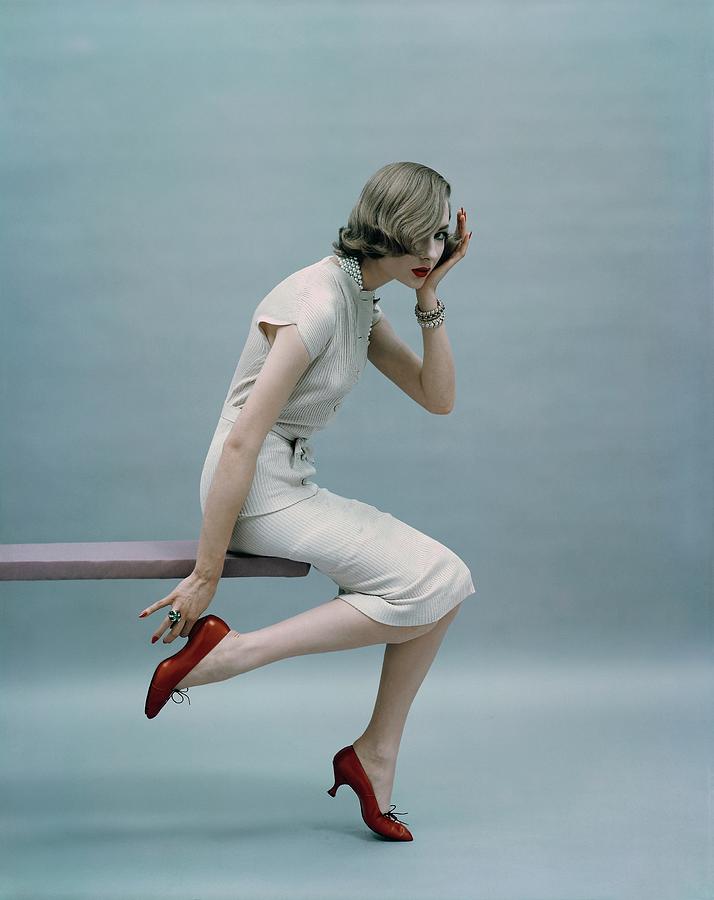 Model Sitting On A Board Photograph by Richard Rutledge