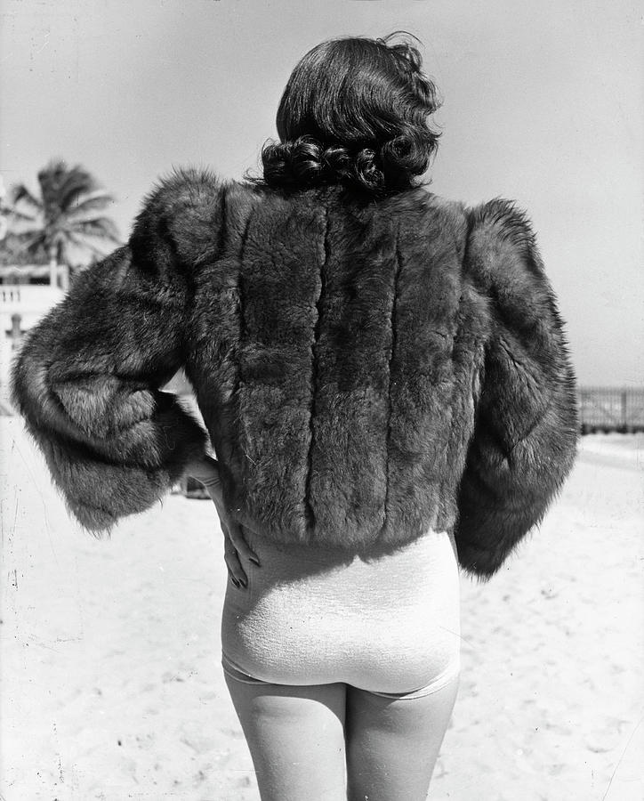 Model Wearing Fur Jacket Over Bathing Su Photograph by Alfred Eisenstaedt Model Wearing Fur Jacket Over Bathing Su Photograph by Alfred Eisenstaedt