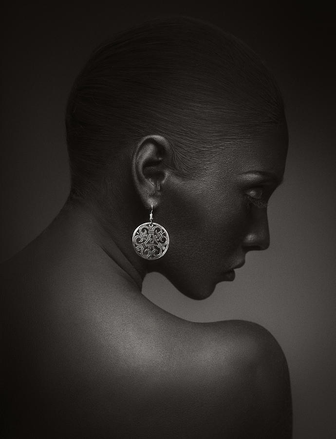 Model With An Earring Photograph by Mark Nazarov