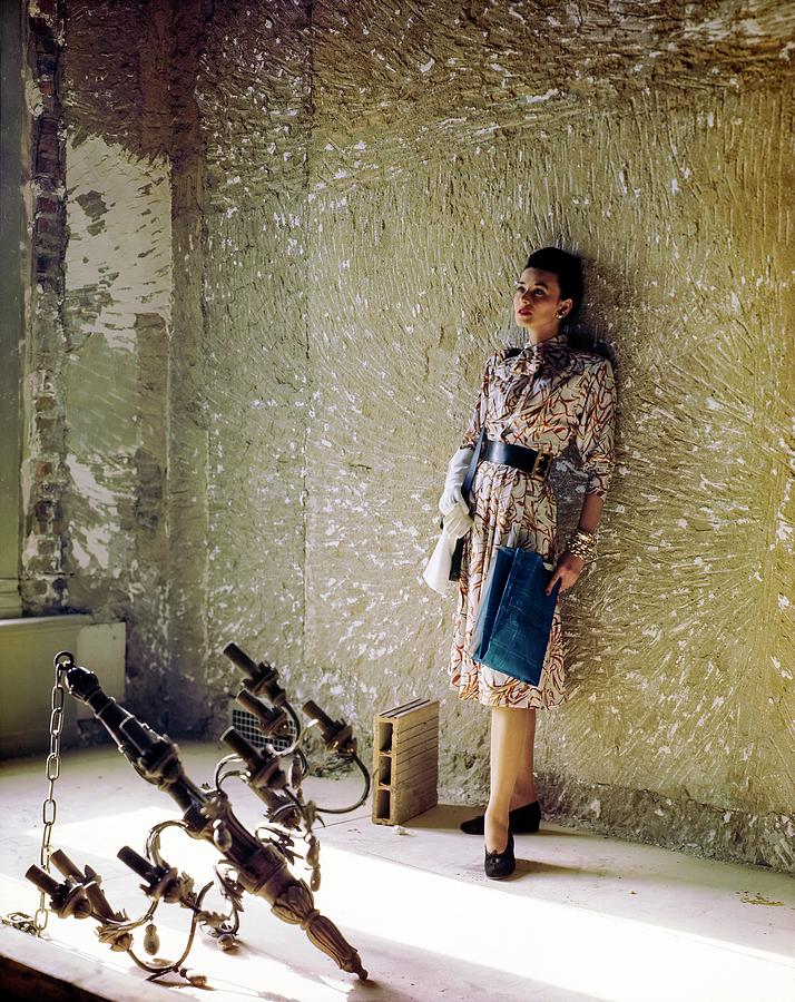 Model With Chandelier In Empty Room Photograph by Serge Balkin