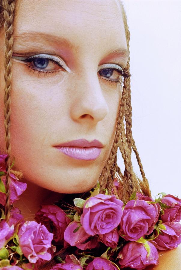 Model with Roses on Her Braids Photograph by Gene Laurents