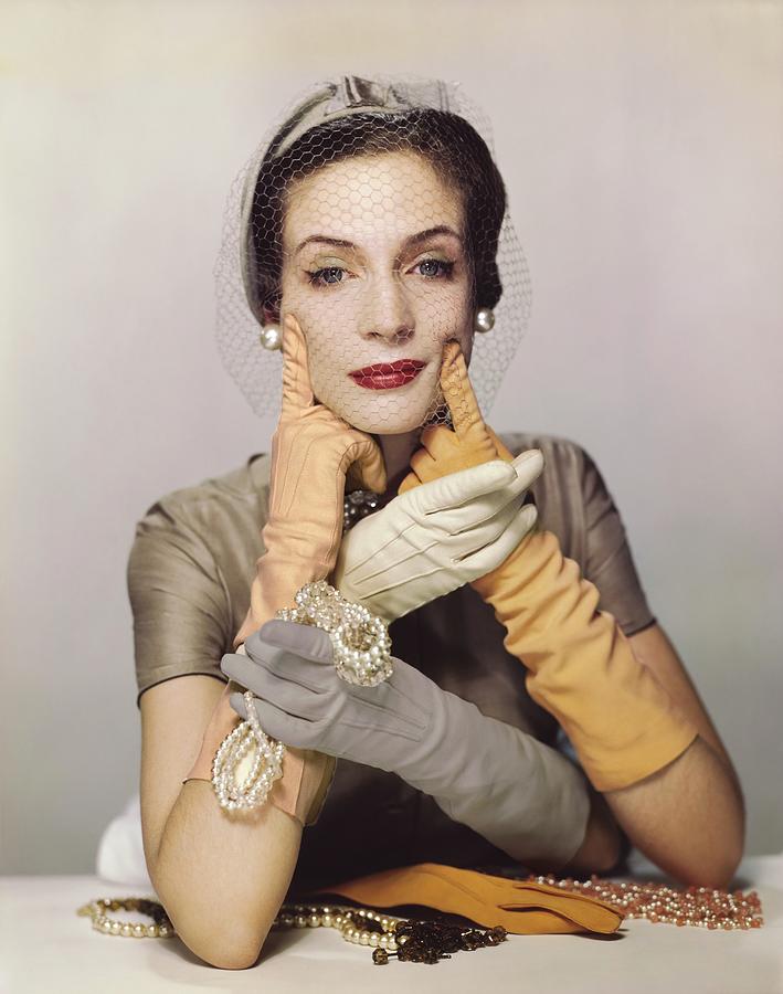 Model With Two Sets Of Gloved Hands Photograph by Erwin Blumenfeld