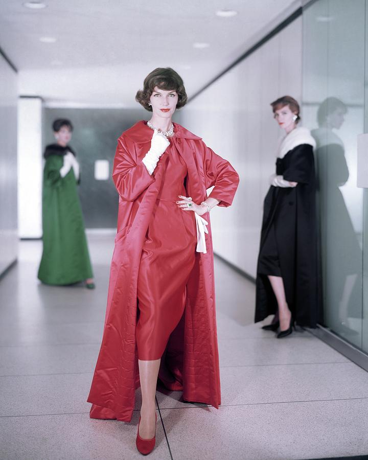 Models In Satin Coats And Dresses Photograph by Horst P. Horst