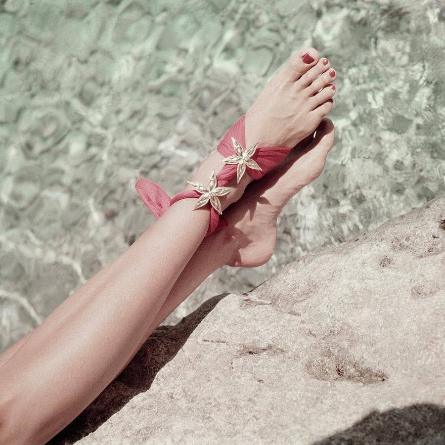 Models Legs On A Rock In Capri Photograph by Frances McLaughlin-Gill