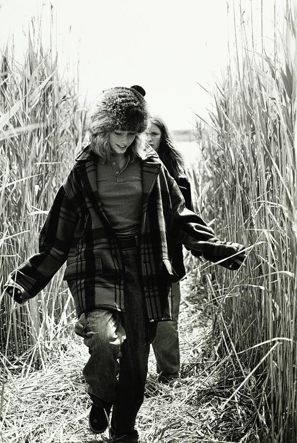 Models Walking Through A Wheat Field Photograph by Arthur Elgort