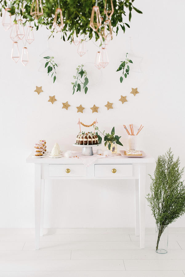 Modern Christmas Buffet On White Console Table Photograph by Katja Heil