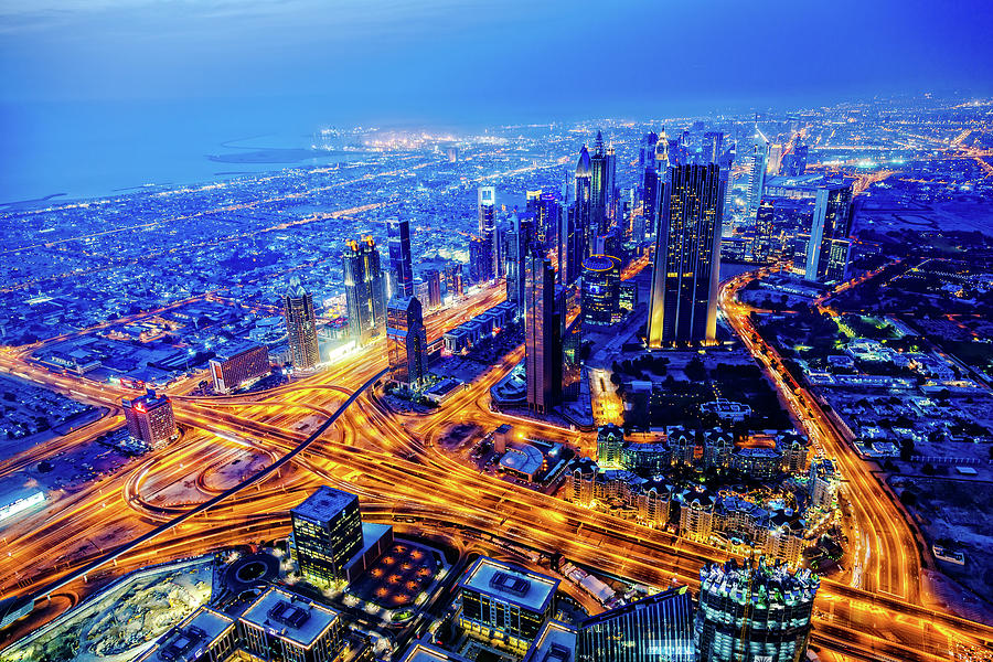 Modern Dubai Cityscape At Twilight Photograph by Mbbirdy