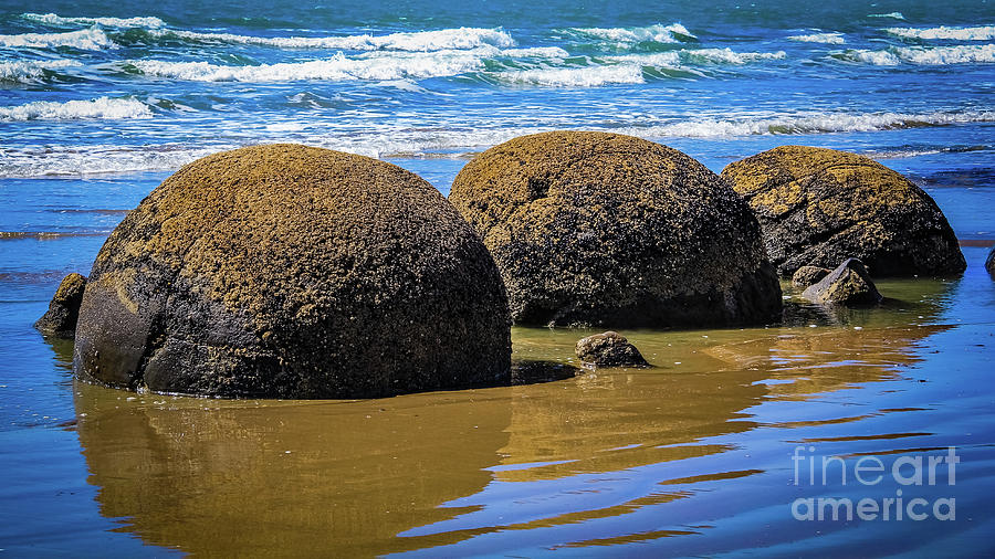 Moeraki boulders, New Zealand Photograph by Lyl Dil Creations