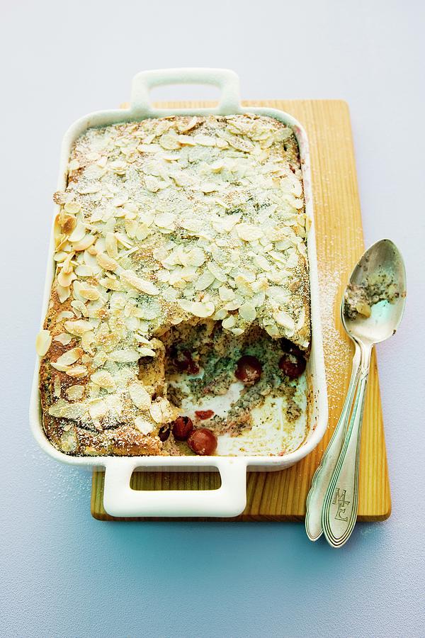 Mohnmichel poppy Seed Bread Pudding With Cherries And Slivered Almonds Photograph by Michael Wissing