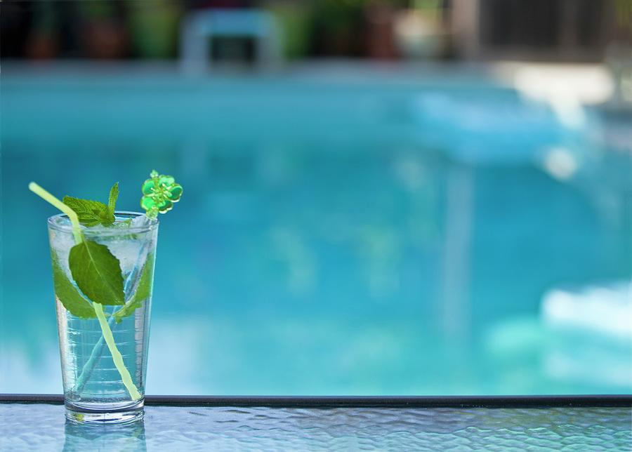 Mojito Cocktail By Swimming Pool Photograph by William Boch