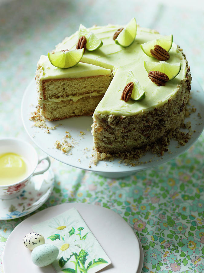 Mojito Sponge Cake With Lime And Pecan Nuts For Easter Photograph by Karen Thomas