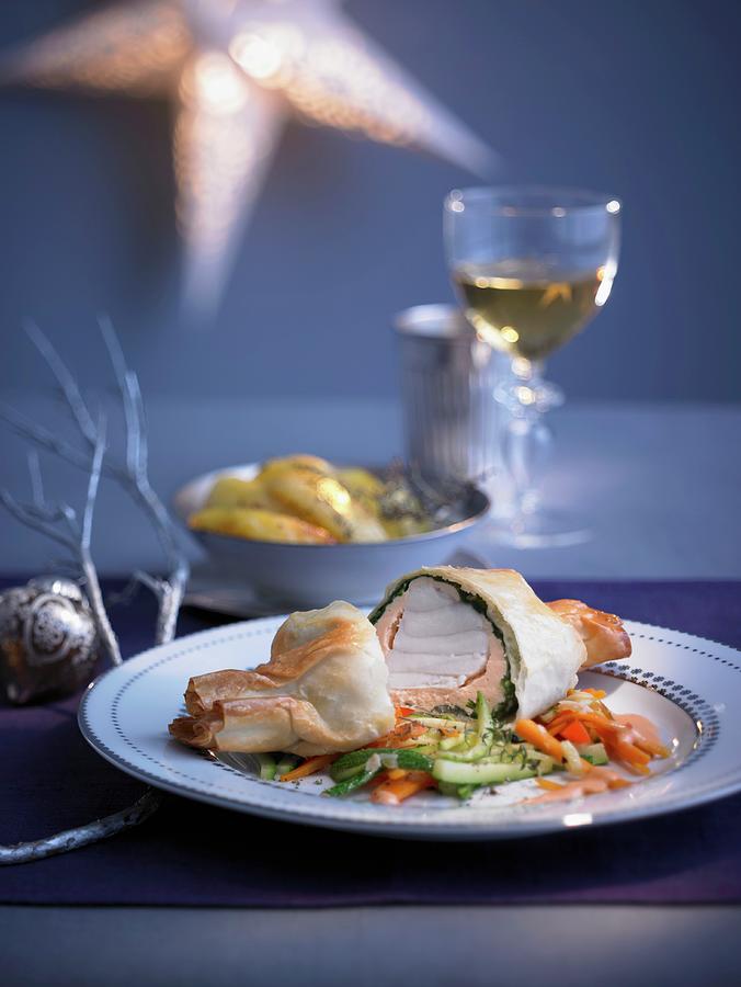 Monk Fish Strudel Filled With Spinach With A Side Of Vegetables And Rouille For Christmas Photograph by Jan-peter Westermann