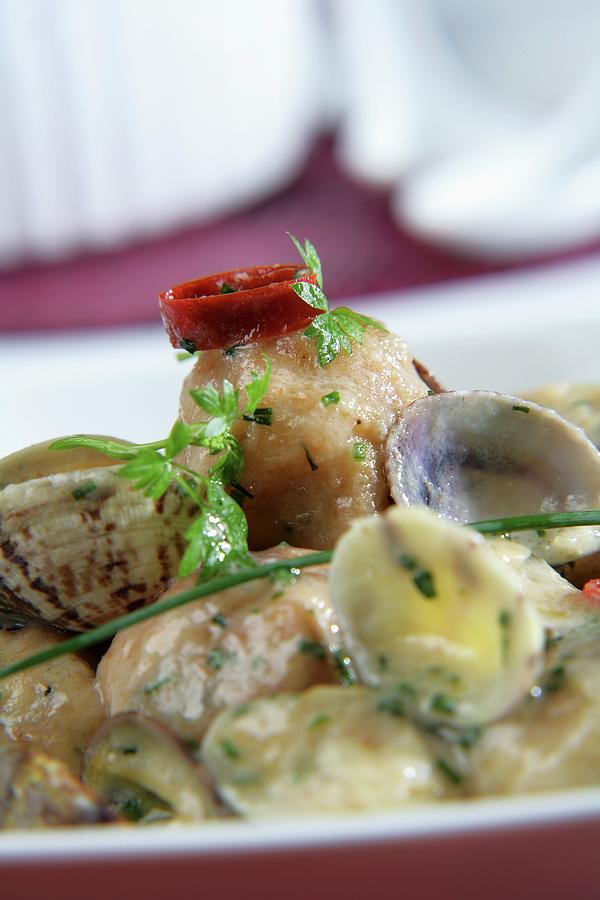 Monkfish Fishballs With Clams In Green Sauce Photograph by Gastromedia